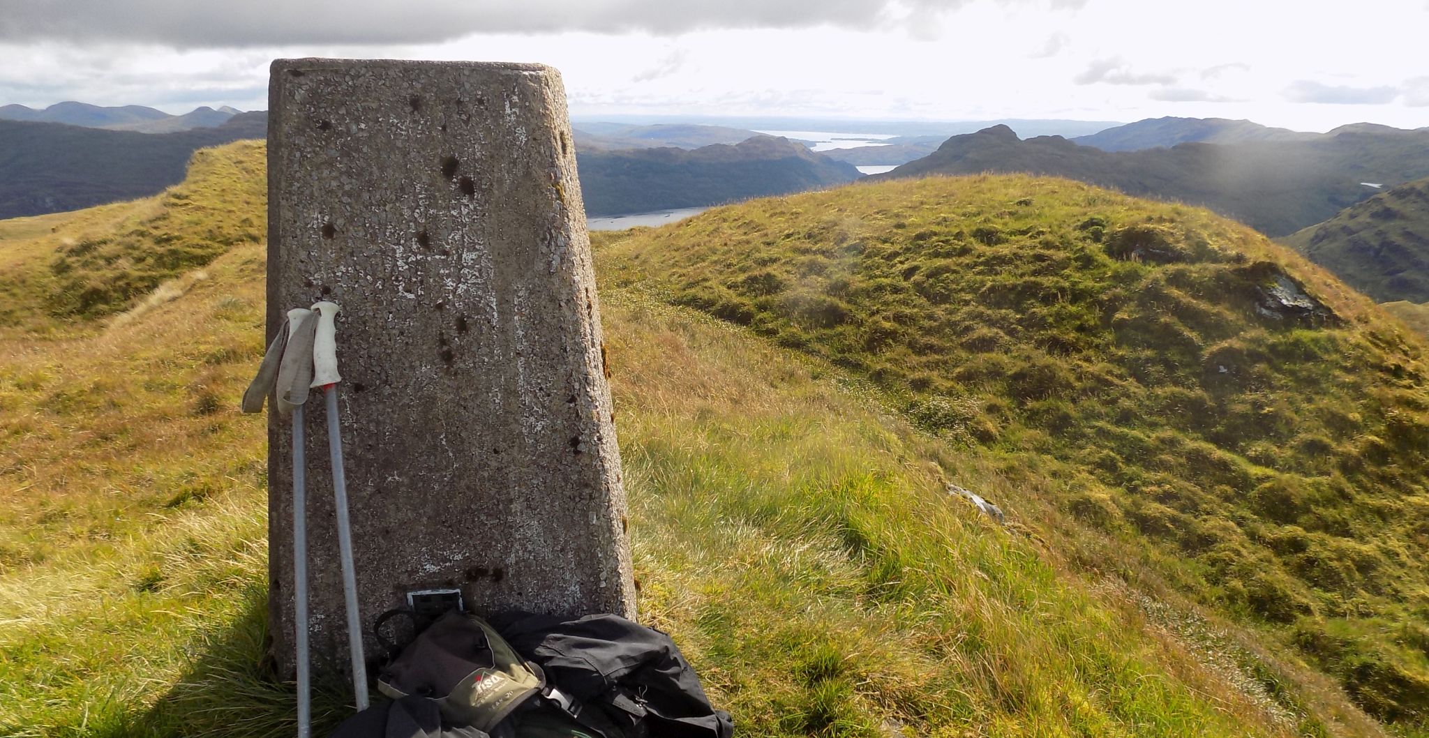 Trig point on summit of Beinn Tharsuinn