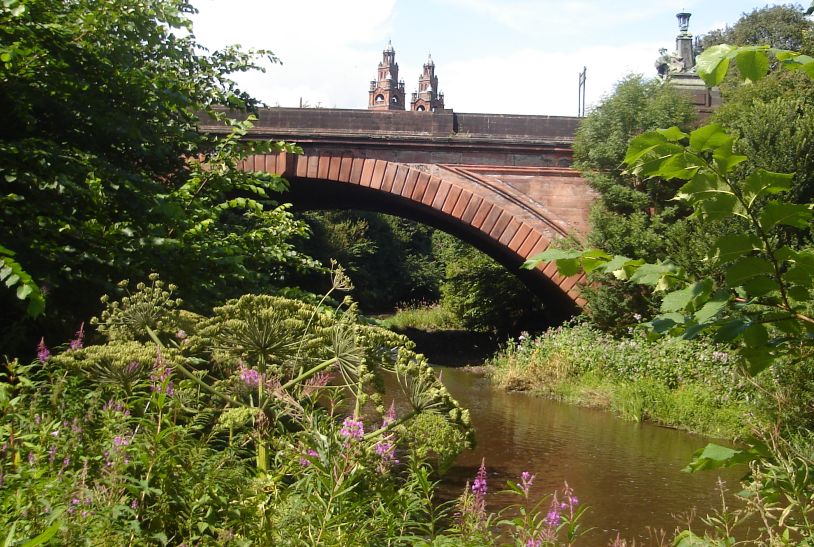 Spires of Glasgow Art Gallery from River Kelvin in Kelvingrove Park